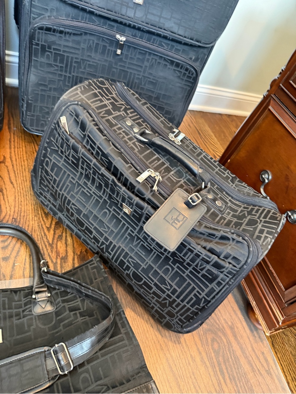 Diane Von Furstenberg DVF Black Monogram large rolling duffle carry on luggage